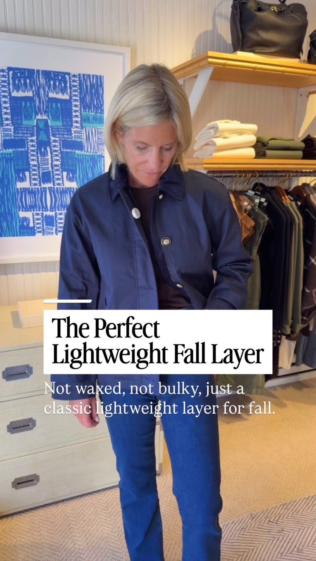 A navy barn jacket with blue jeans for an easy fall look.