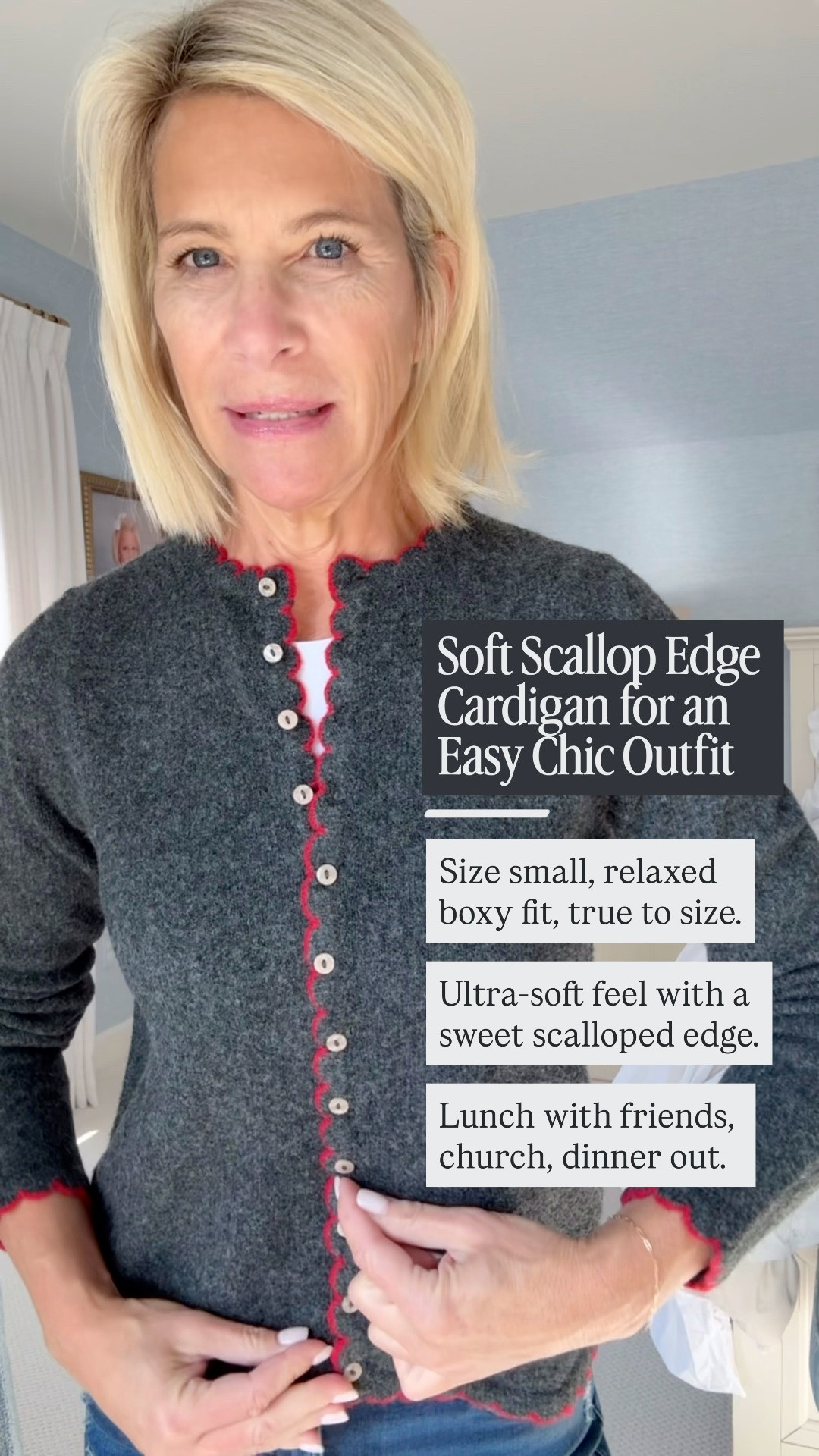 A soft charcoal cardigan with a scalloped edge.
